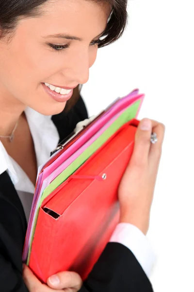 Businesswoman holding folders — Stock Photo, Image