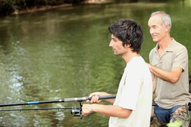 Two men fishing clipart