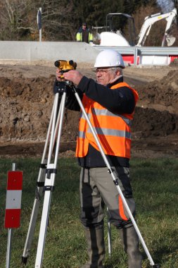 Man surveying site clipart