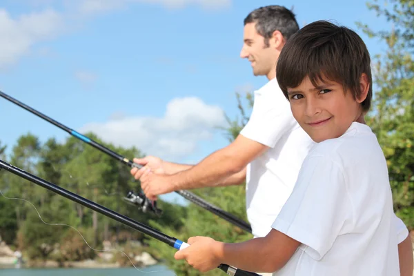 Father and his little boy fishing — Stock Photo, Image