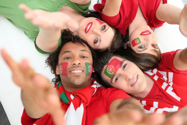 Portuguese football fans reaching out — Stock Photo, Image