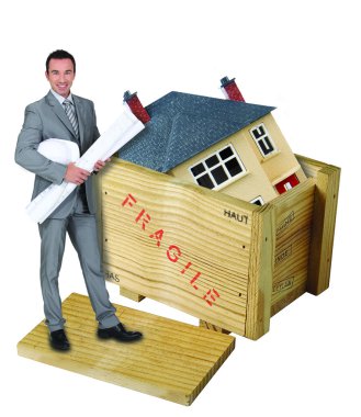 Architect stood with model house in background clipart