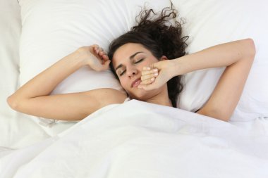 A woman waking up clipart