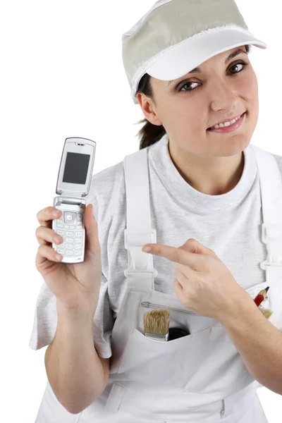 Craftswoman segurando um celular — Fotografia de Stock