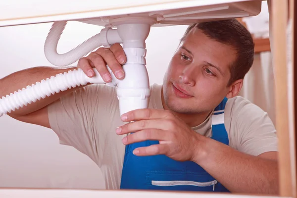 Portrait of a young plumber — Stockfoto