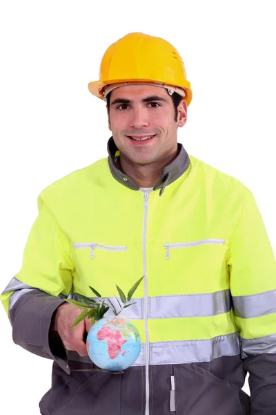 A construction worker promoting ecology. — Stock Photo, Image