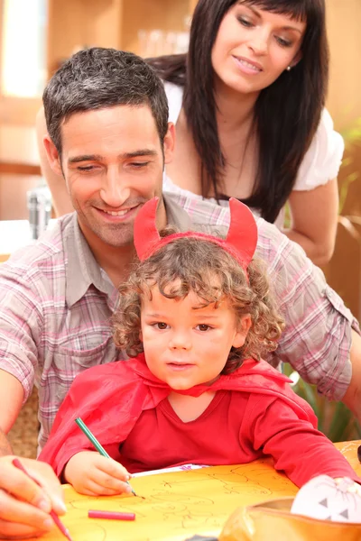 Portrait of a little girl and parents — Stock Photo, Image