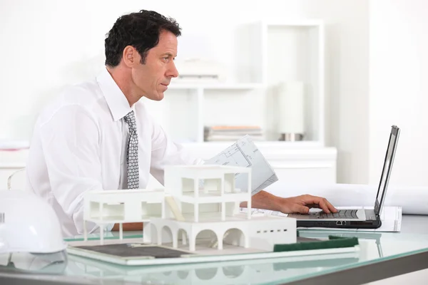 Architect working in his office — Stock Photo, Image