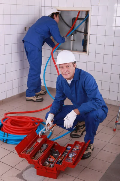 Workers in house — Stock Photo, Image
