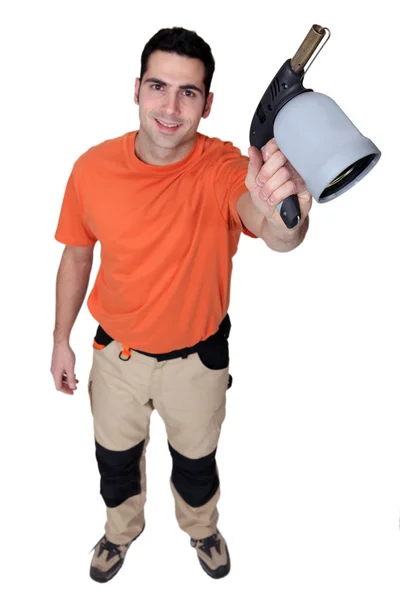 Homem segurando maçarico — Fotografia de Stock