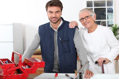 Young man assisting old lady clipart