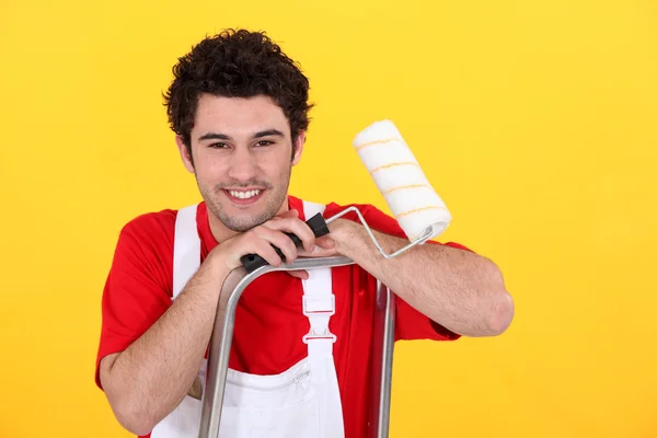 Male decorator stood in ladder — Stock Photo, Image