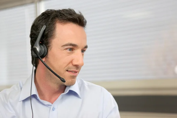 Office worker with headset — Stock Photo, Image