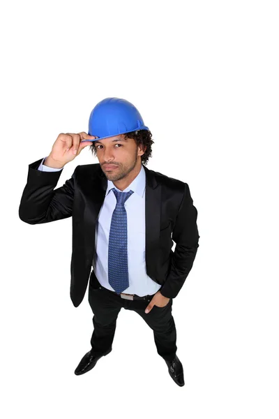 Businessman wearing a hardhat — Stock Photo, Image