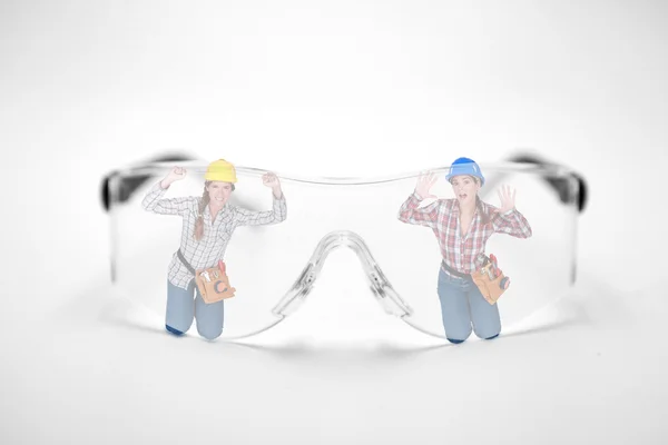 Women imprisoned behind goggles — Stock Photo, Image