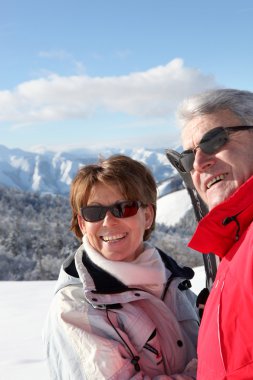 Mature ski couple clipart