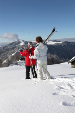 Old couple skiing clipart