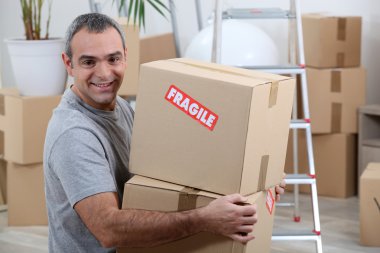 Portrait of a man with cardoard boxes clipart