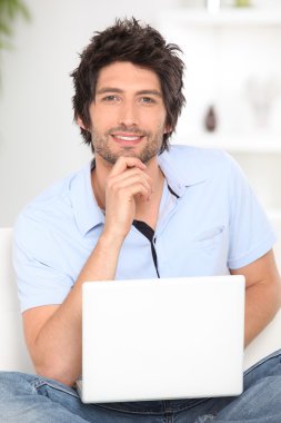 Man looking up from his work clipart