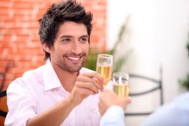 Couple drinking champagne clipart