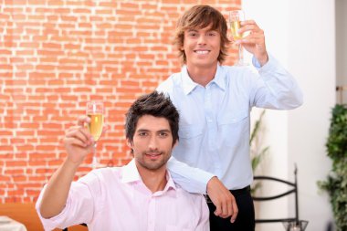 Young men in a wine bar clipart