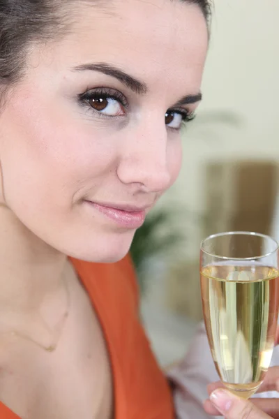 Woman drinking champagne — Stock Photo, Image