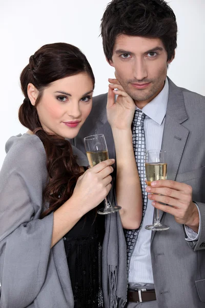 A couple drinking champagne. — Stock Photo, Image