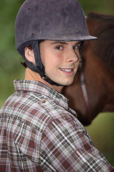 Portrait of a young horseback rider — Stock Photo, Image