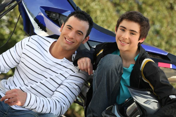 Portrait of father and teenage son — Stock Photo, Image