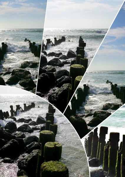 Morze, skały i kije do hodowlanych małże — Zdjęcie stockowe