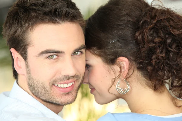 Couple sharing a private moment — Stock Photo, Image