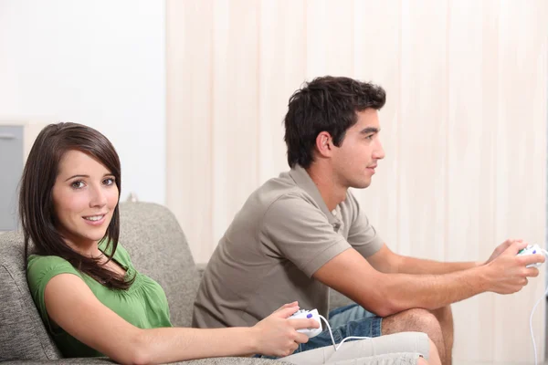 Young couple playing computer games — Stock Photo, Image