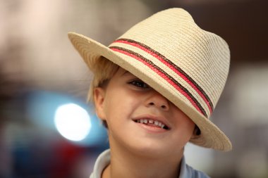 Child wearing a Fedora hat clipart