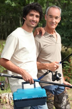 Father and son fishing clipart