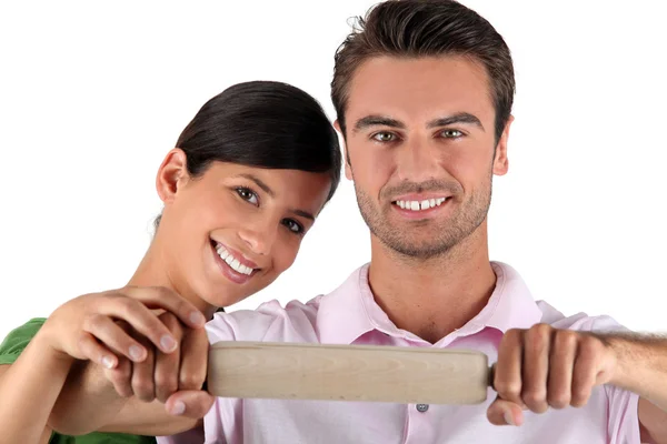 Man and woman with pastry — Stock Photo, Image