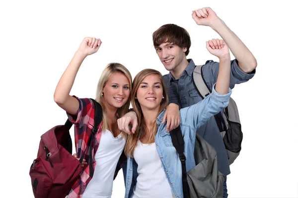 Studenti con le braccia alzate — Foto Stock