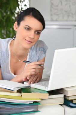 Woman studying from home clipart