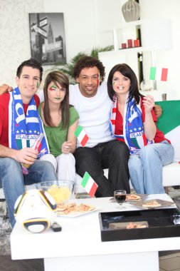 Friends supporting the Italian football team clipart