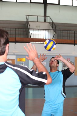 Volley-ball player in action clipart