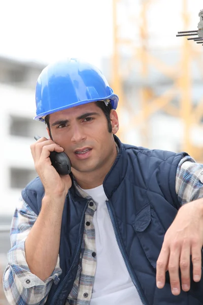 Constructor en walkie talkie —  Fotos de Stock