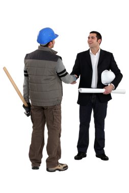 Architect shaking laborer's hand clipart