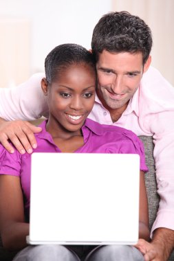 Couple on computer clipart