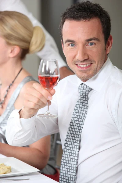 Portrait of a man toasting — Stock Photo, Image