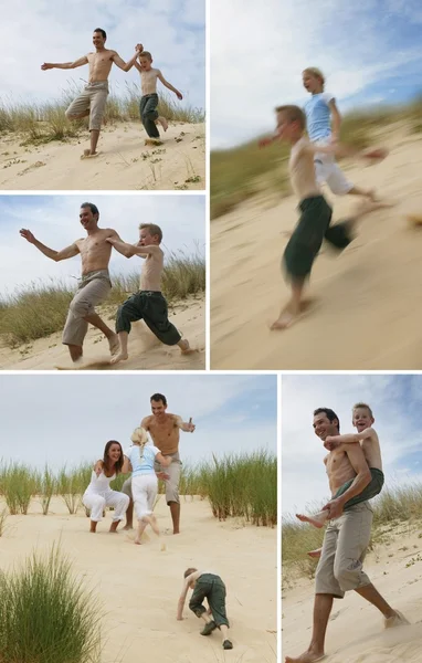 Una familia corriendo por las dunas — Foto de Stock
