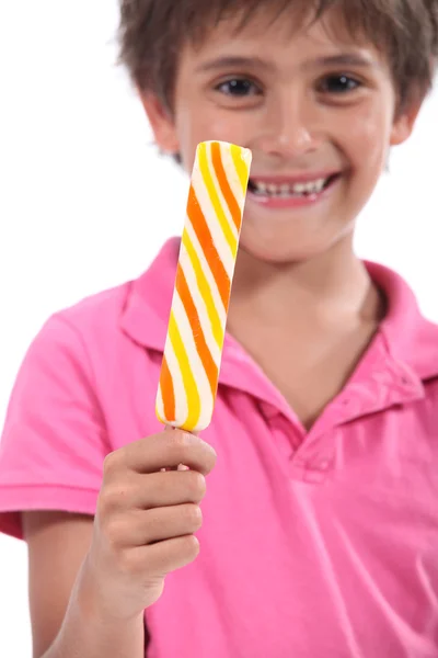 Boy with a lolly pop — Stock Photo, Image