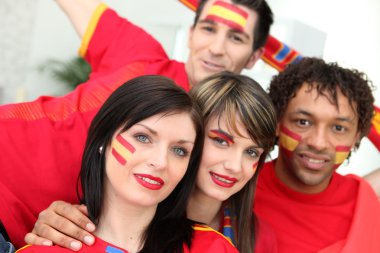 Group of young Spanish football supporters clipart