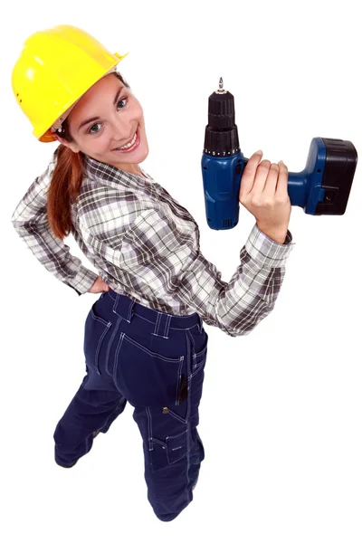 Donna con un trapano elettrico — Foto Stock