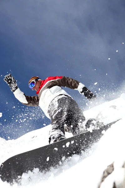 Snowboarder pulverização em pó — Fotografia de Stock