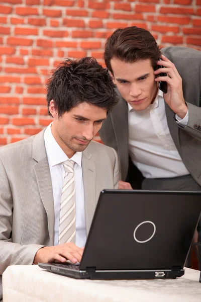 Men resolving a problem on computer — Stock Photo, Image