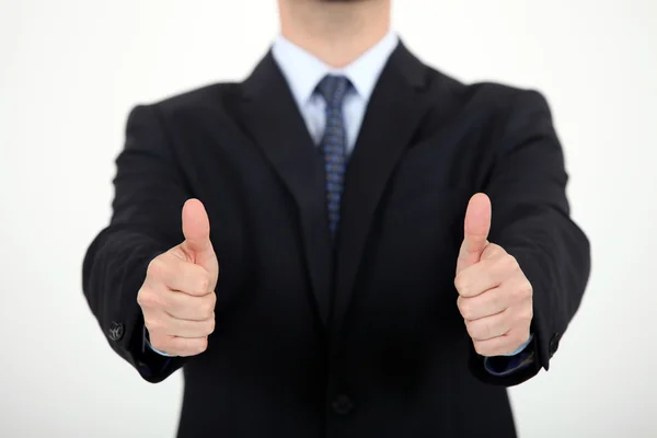 Businessman giving thumbs-up — Stock Photo, Image